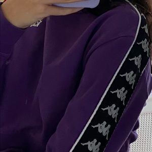 Purple Kappa crewneck.